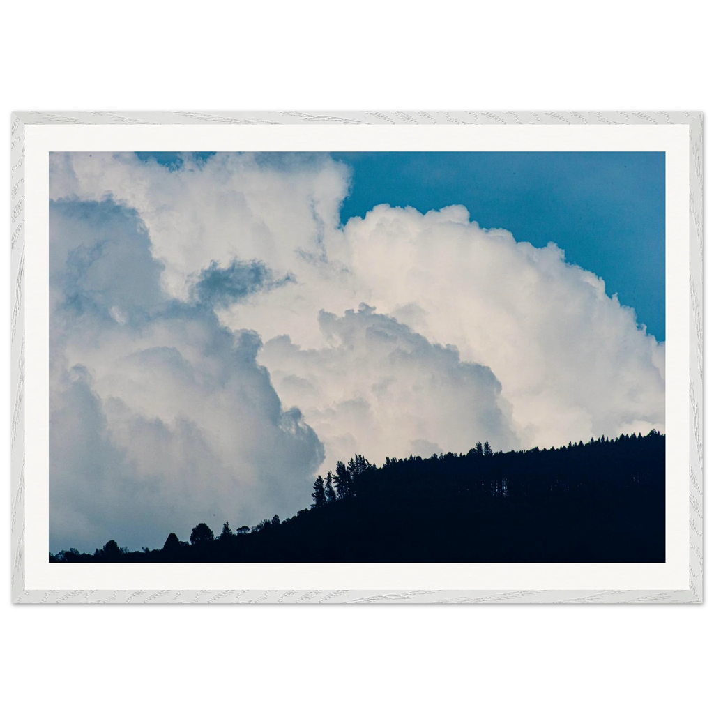 Majestic cloud blue sky framed print displayed in modern interior