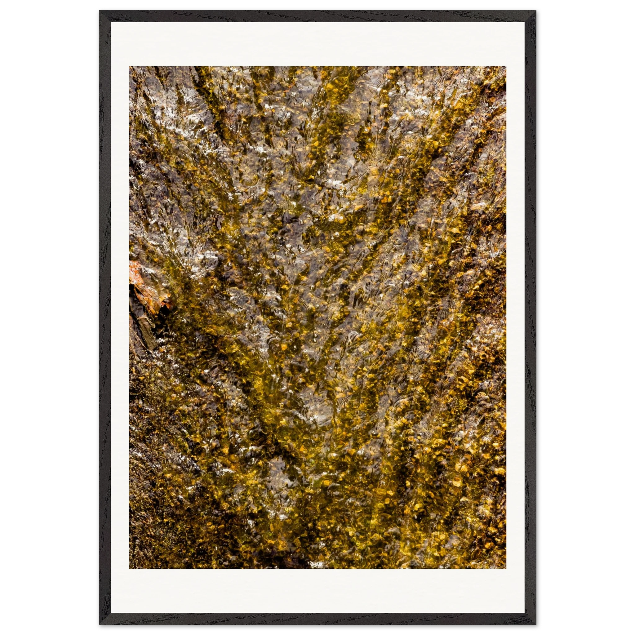 Golden water framed print displayed in modern living room